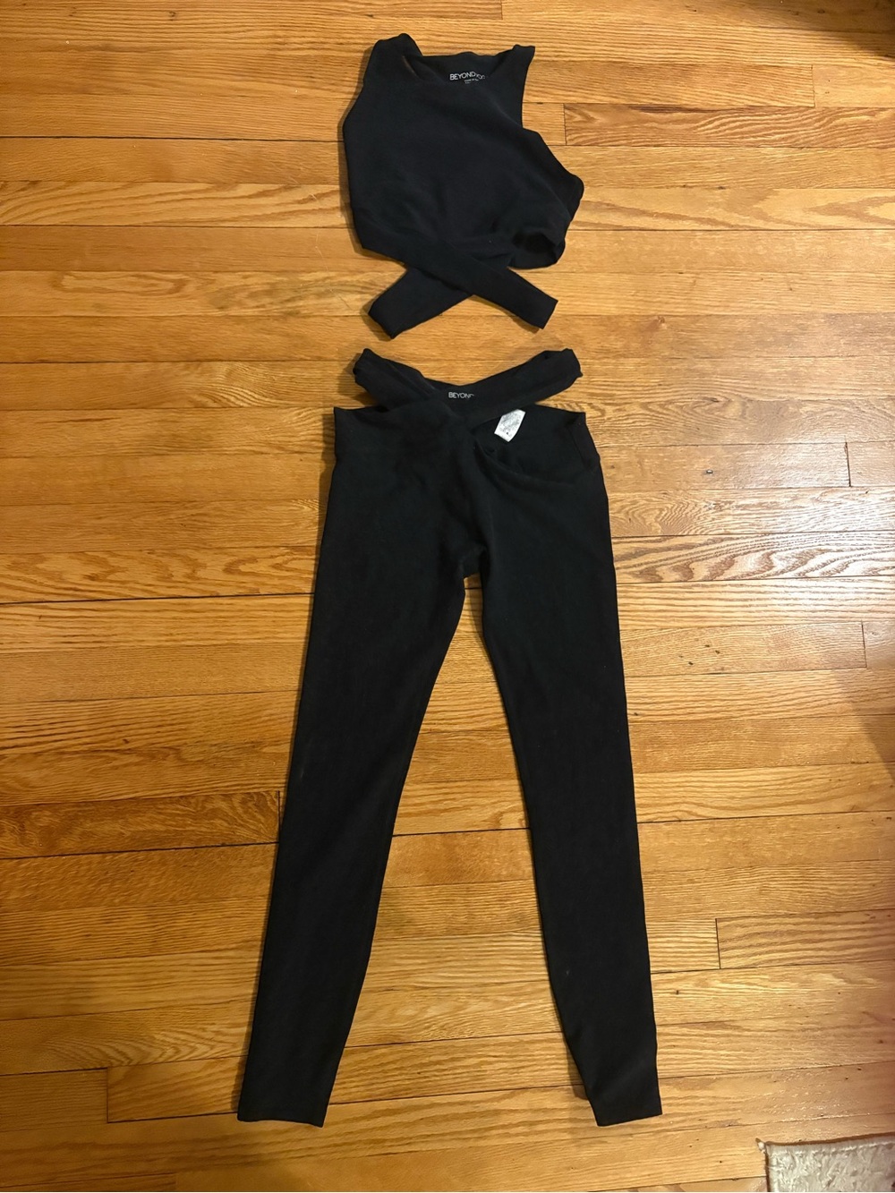 Beyond Yoga Black Crisscross Waist Leggings with Matching Black Twist Crop